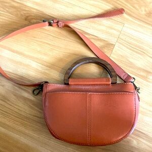 Rachel Roy crossbody hang bad with wooden handles